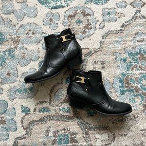 Cute black ankle booties with gold buckle